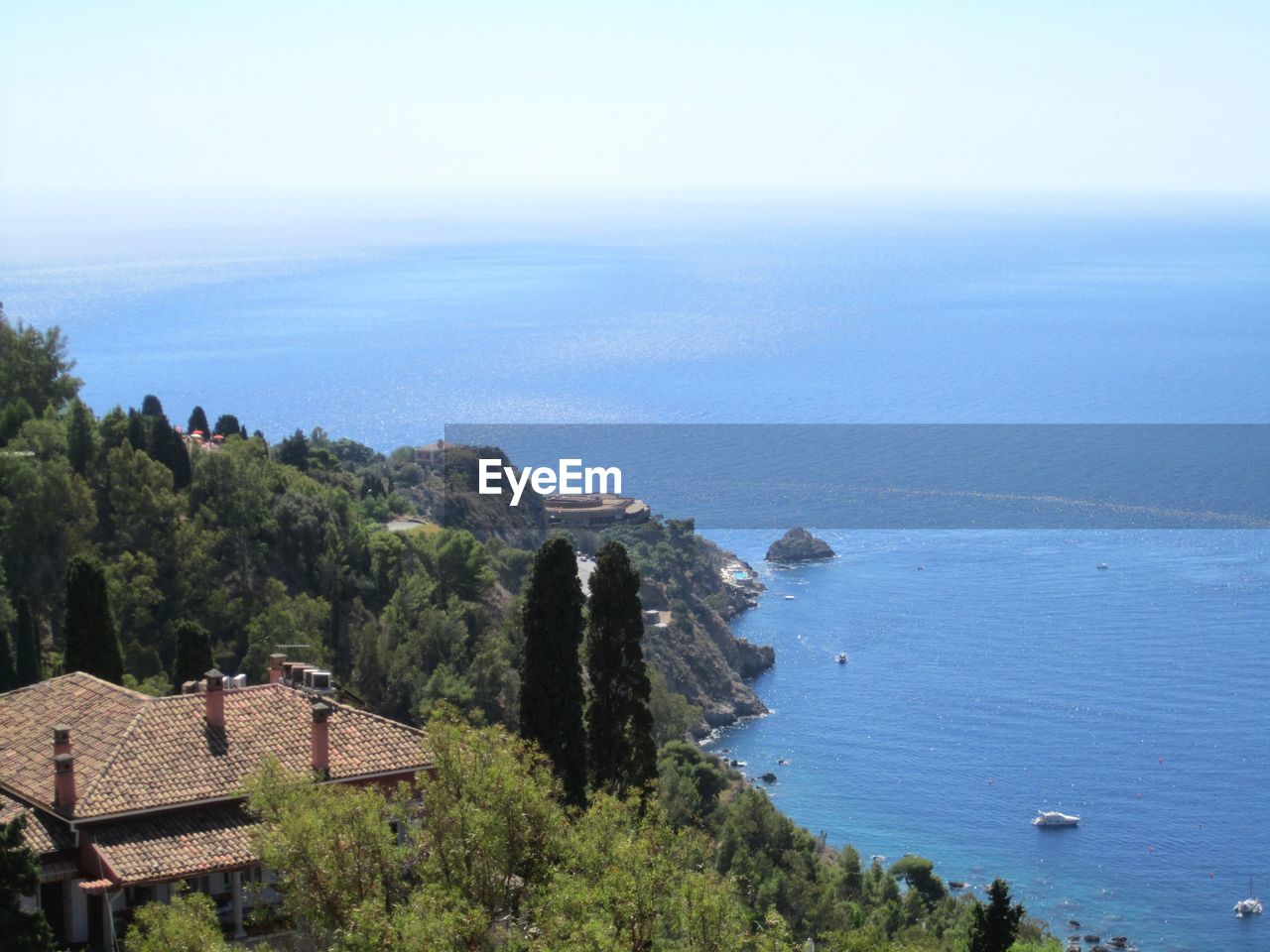 High angle view of houses in calm sea