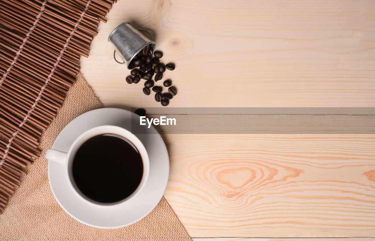 High angle view of coffee cup on table