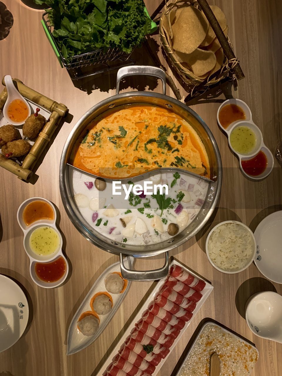 HIGH ANGLE VIEW OF SPICES IN PLATE ON TABLE