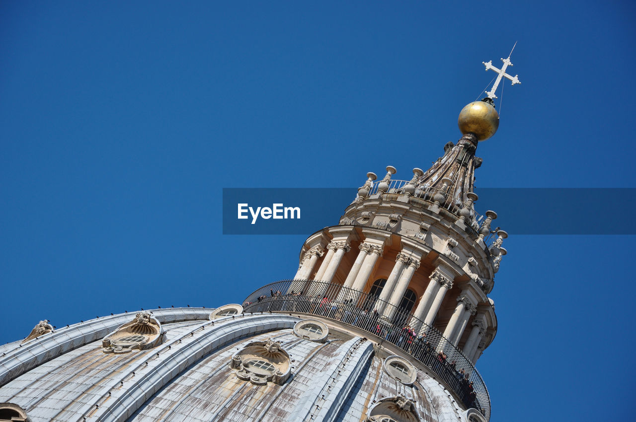 Tourists visiting the cupola of the saint peter's basilica in vatican city 