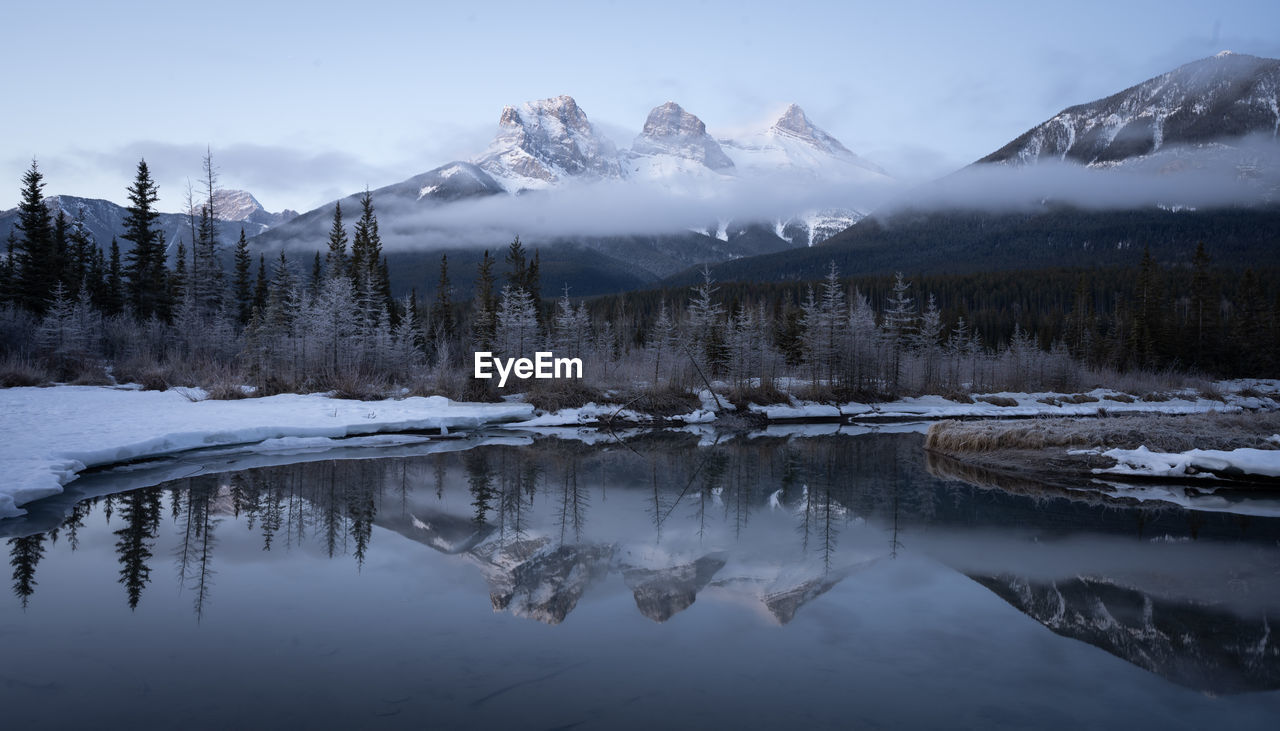 Winter sunrise shot from canadian rockies,three sisters mountain, canmore, canada