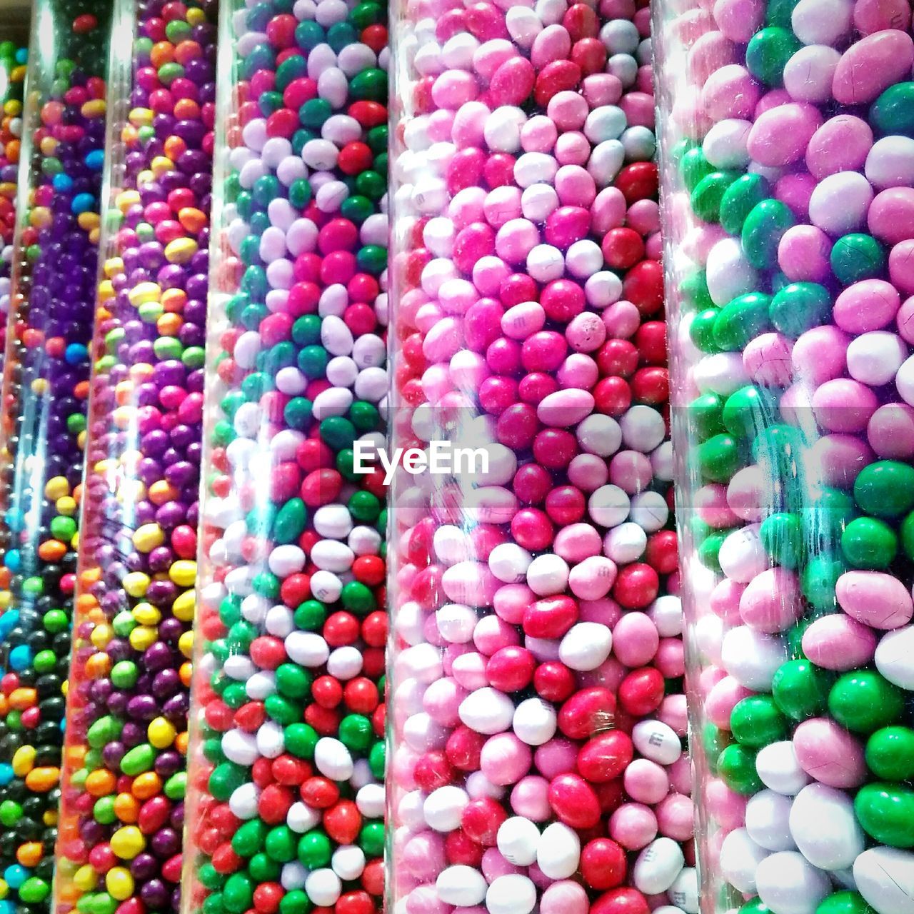 FULL FRAME SHOT OF MULTI COLORED CANDIES FOR SALE