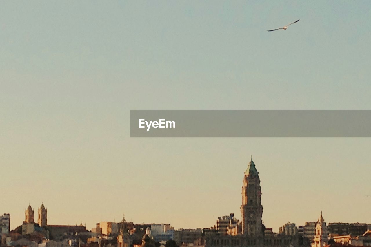 VIEW OF CITYSCAPE AGAINST CLEAR SKY