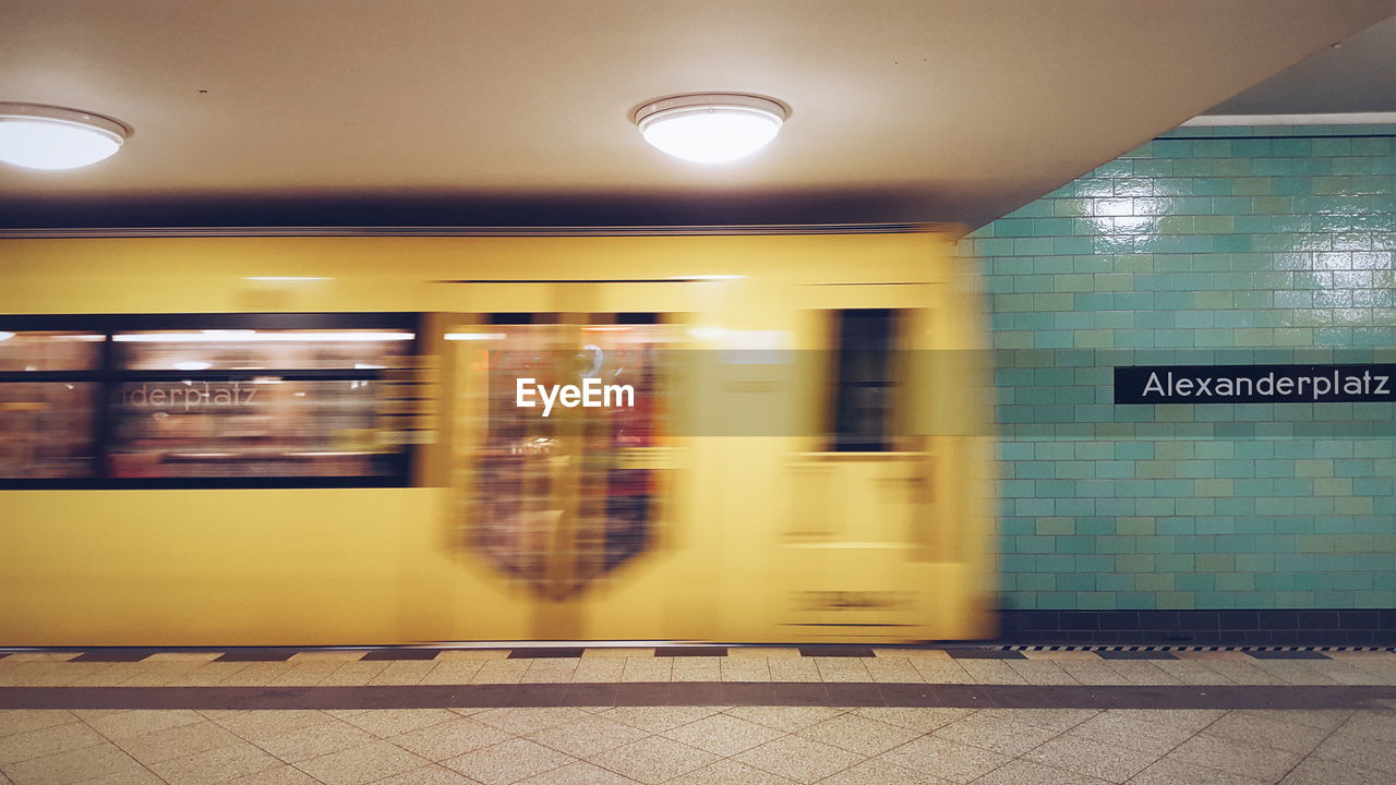 Blurred motion of metro train at subway station