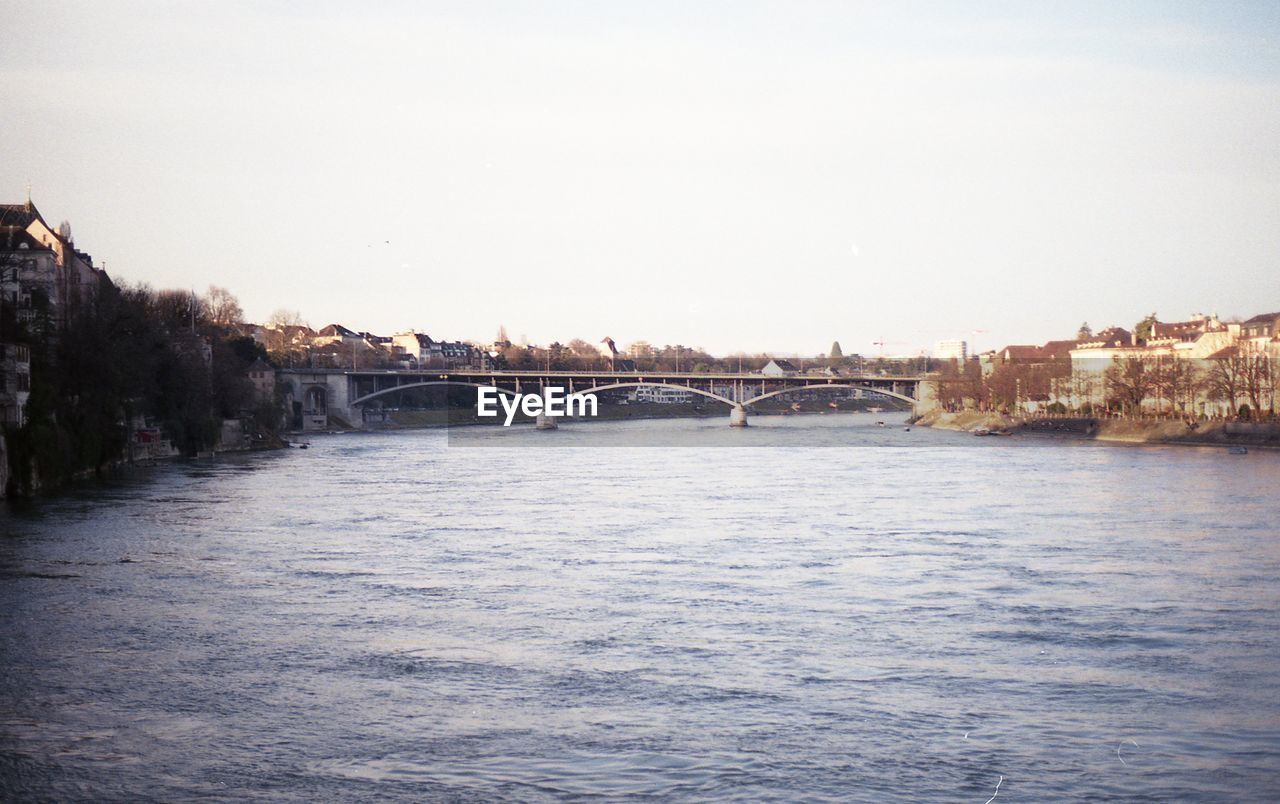 VIEW OF BRIDGE OVER RIVER AGAINST CLEAR SKY