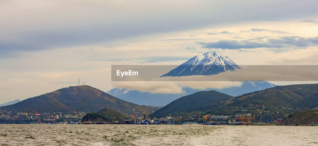 The panoramic view of the city petropavlovsk-kamchatsky and koryaksky volcano