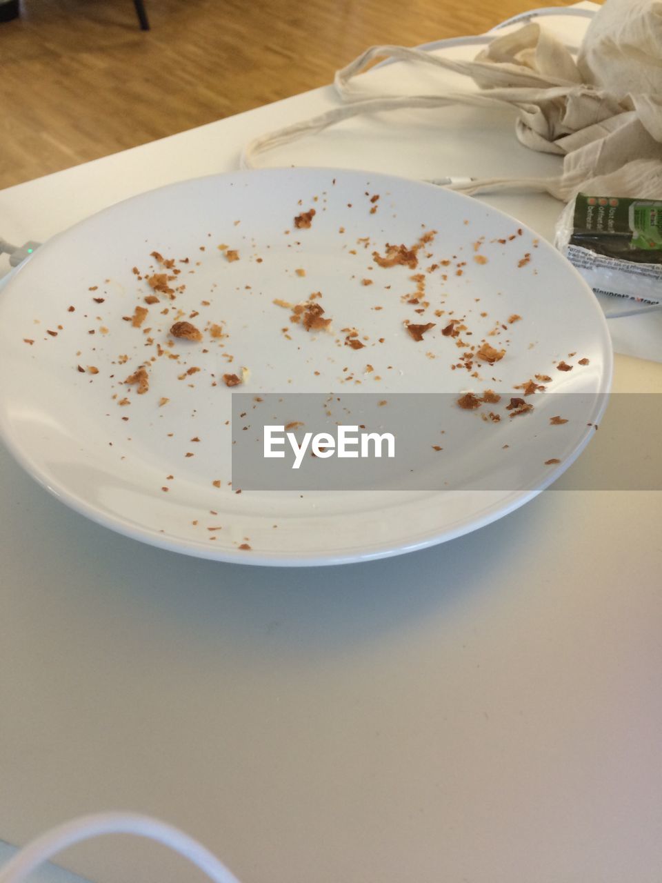 High angle view of leftovers in plate on table