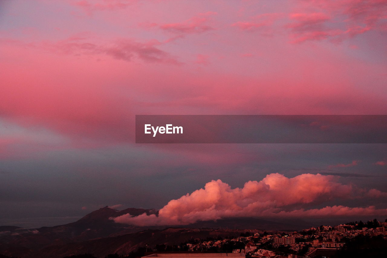 Cityscape against sky during sunset