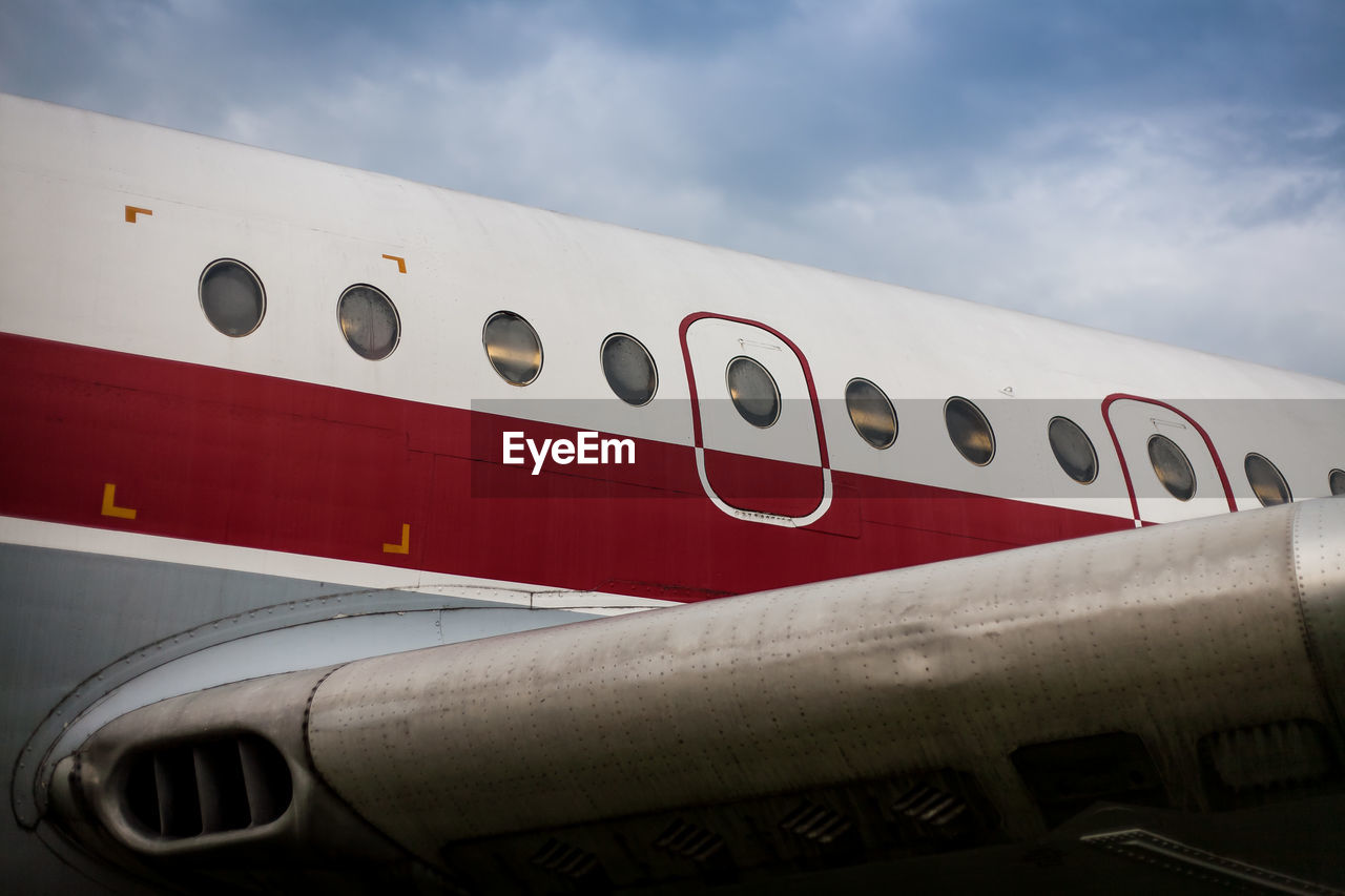 Low angle view of airplane against sky