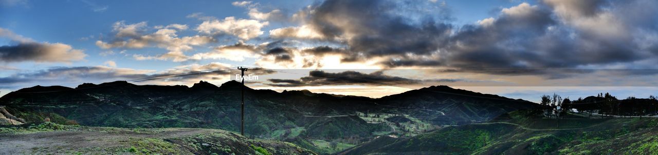 Panoramic view of landscape against sky during sunset