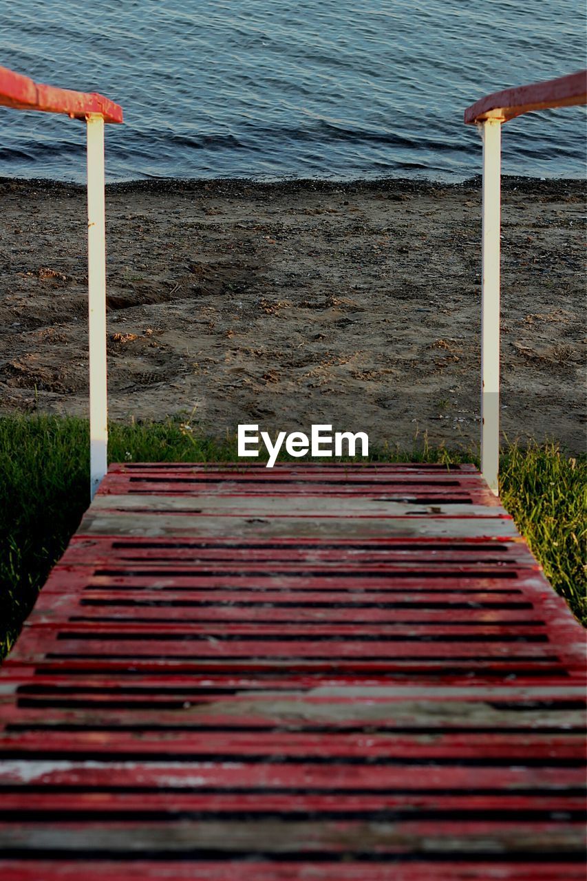 High angle view of railing at beach