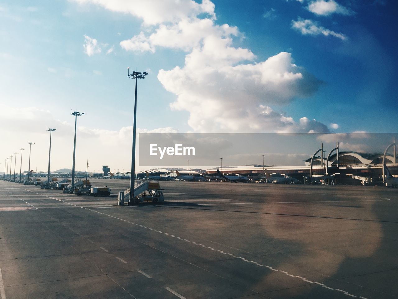 CARS ON ROAD AGAINST SKY