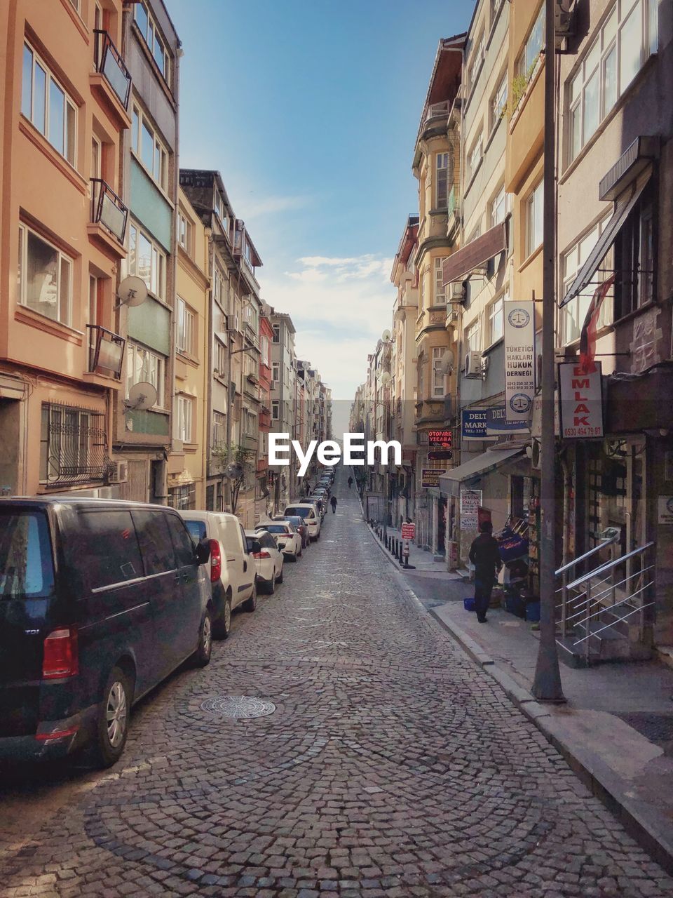 STREET AMIDST BUILDINGS IN CITY