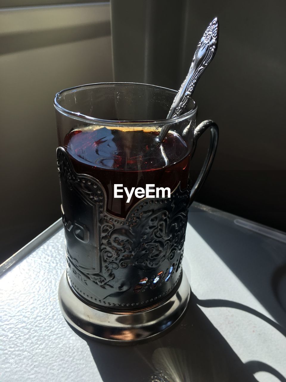 CLOSE-UP OF DRINK IN GLASS