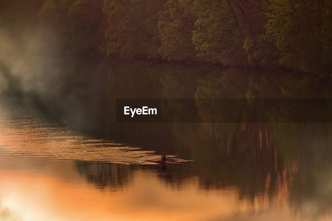 Scenic view of lake during sunset