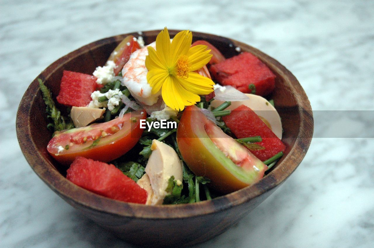 Close-up of salad in bowl on table