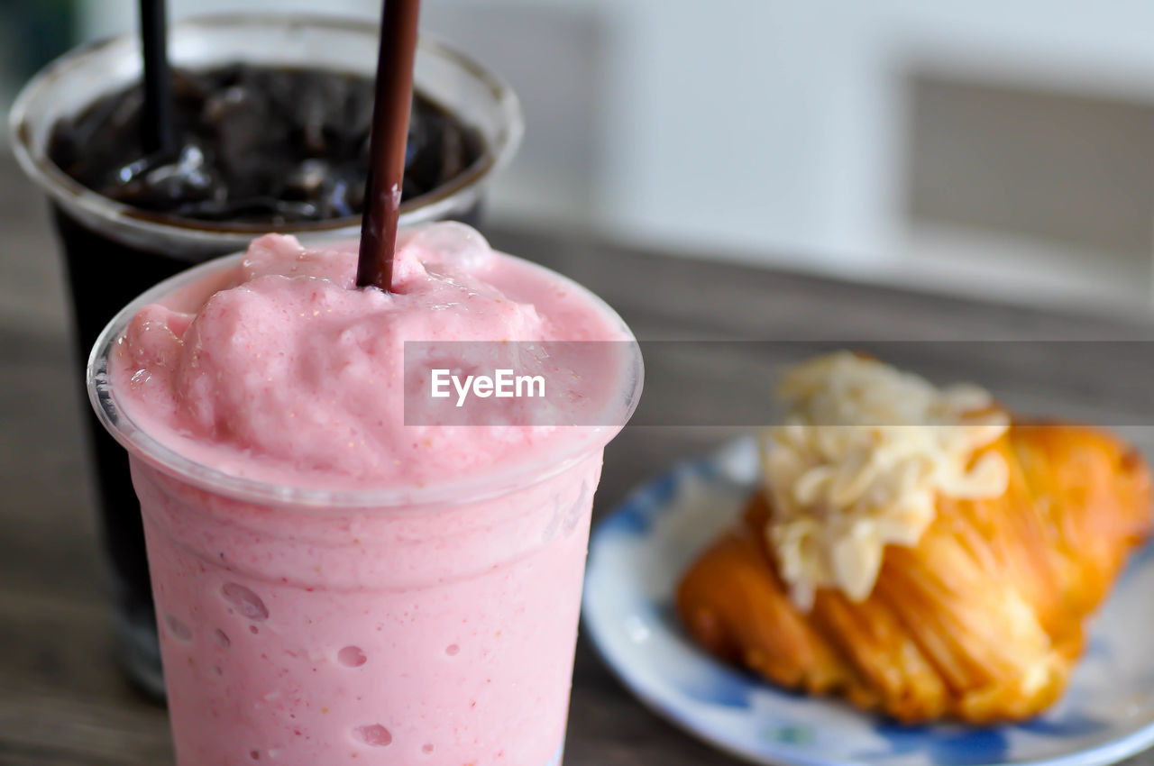 CLOSE-UP OF ICE CREAM WITH JUICE