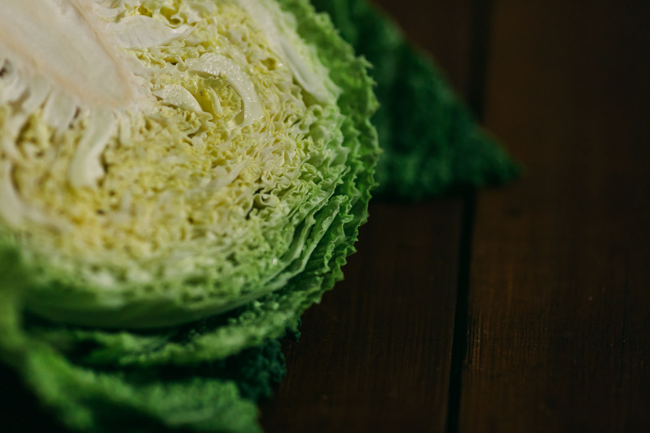 High angle view of halved cabbage on table