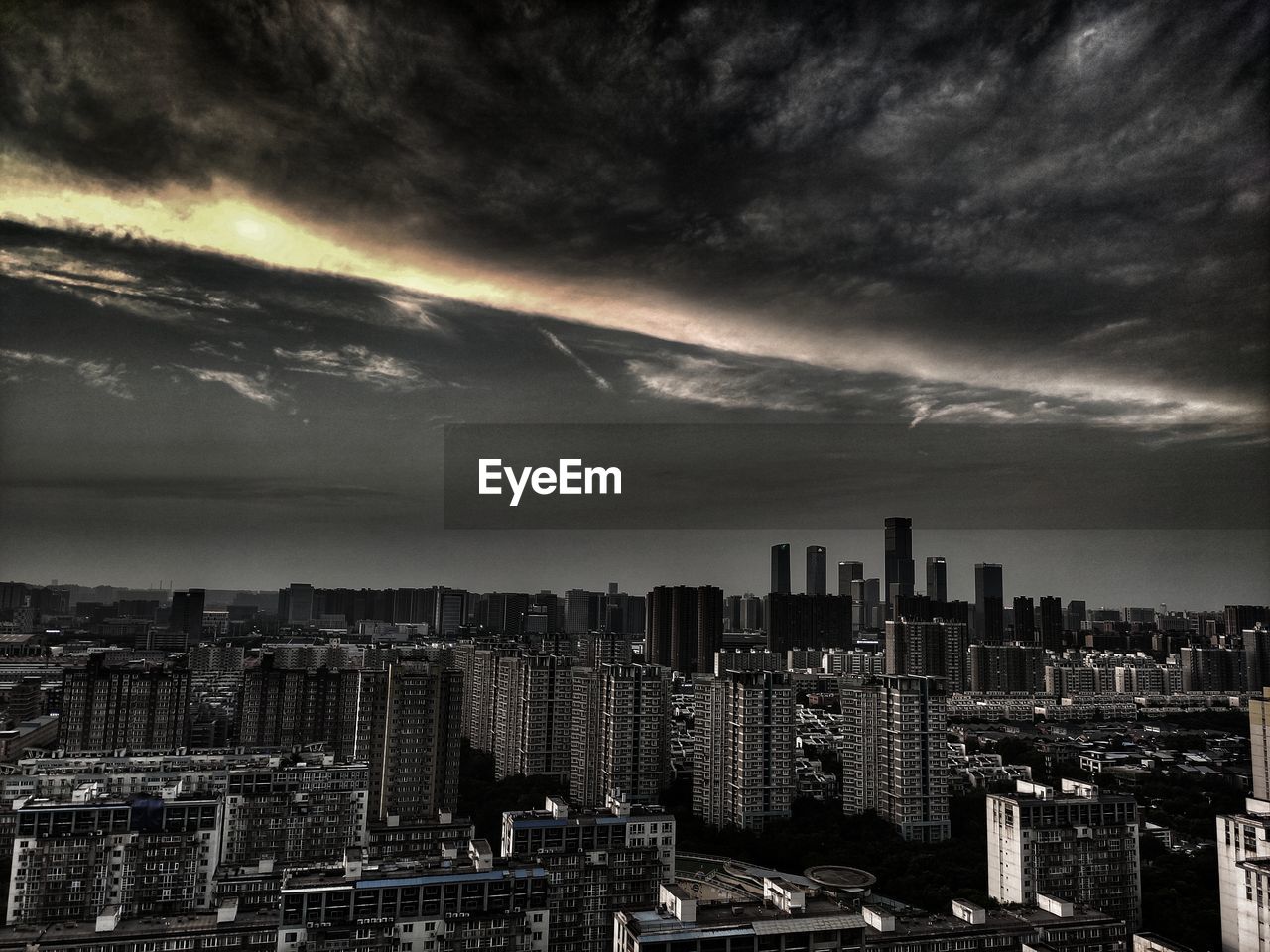 AERIAL VIEW OF CITY AGAINST SKY