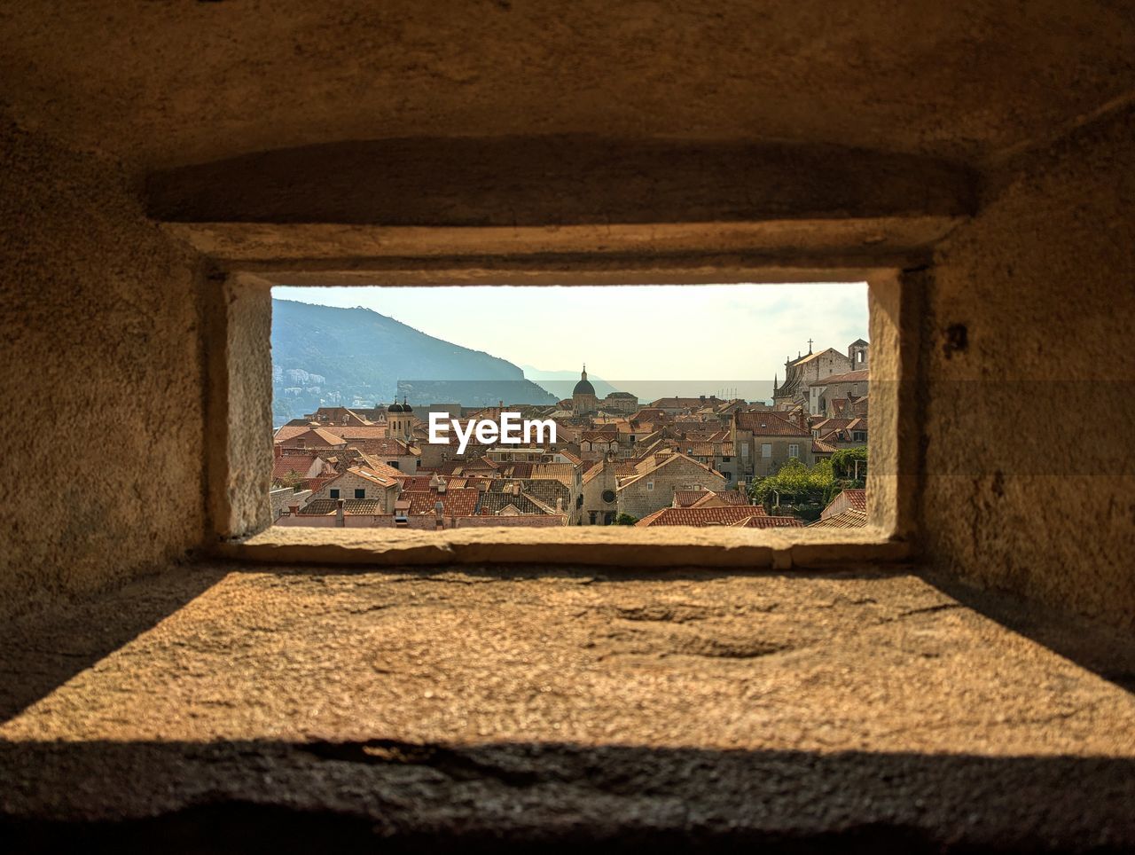 architecture, wall, built structure, nature, history, window, building, no people, house, ancient history, the past, sunlight, building exterior, day, sky, travel destinations, wall - building feature, ancient, wood, outdoors, light, travel, landscape, shadow, old, rock, arch, land, darkness