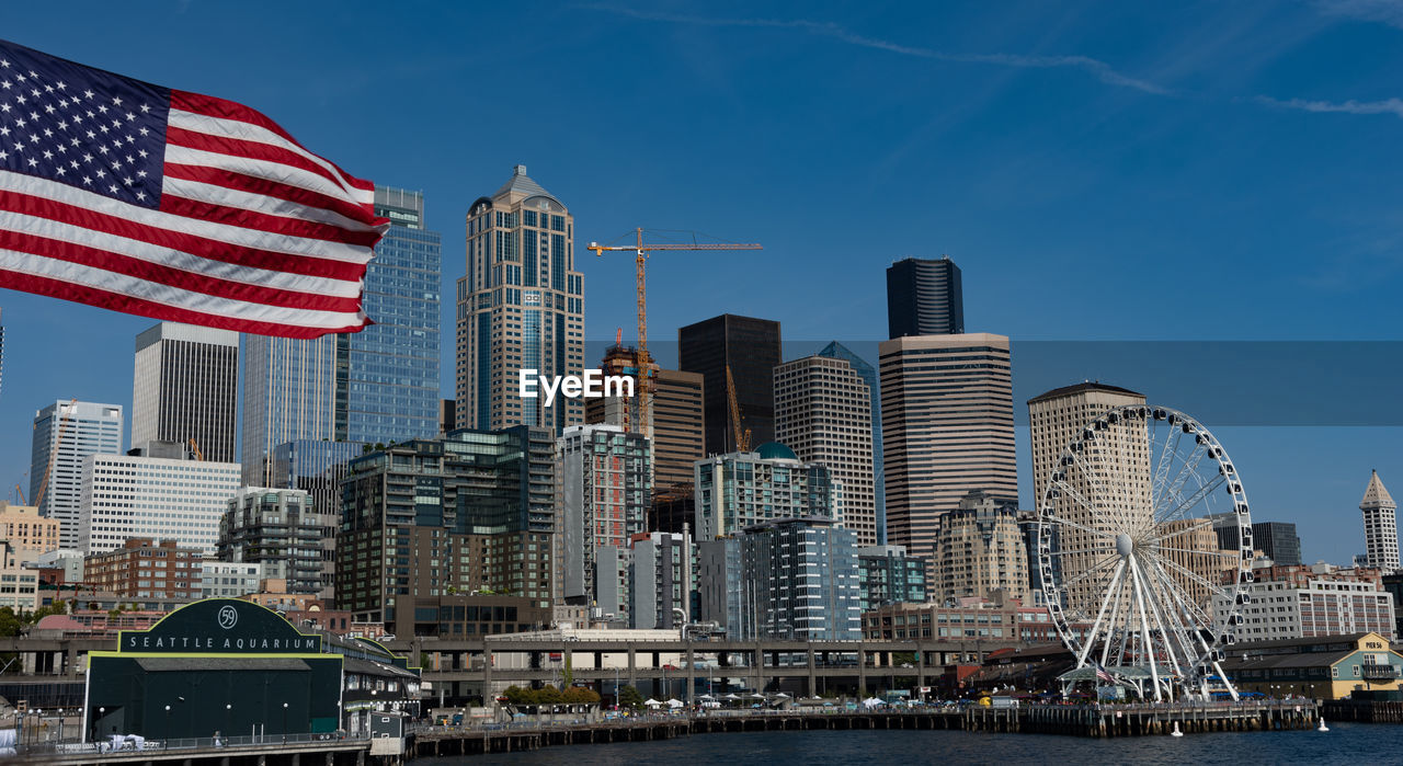 VIEW OF MODERN BUILDINGS AGAINST SKY