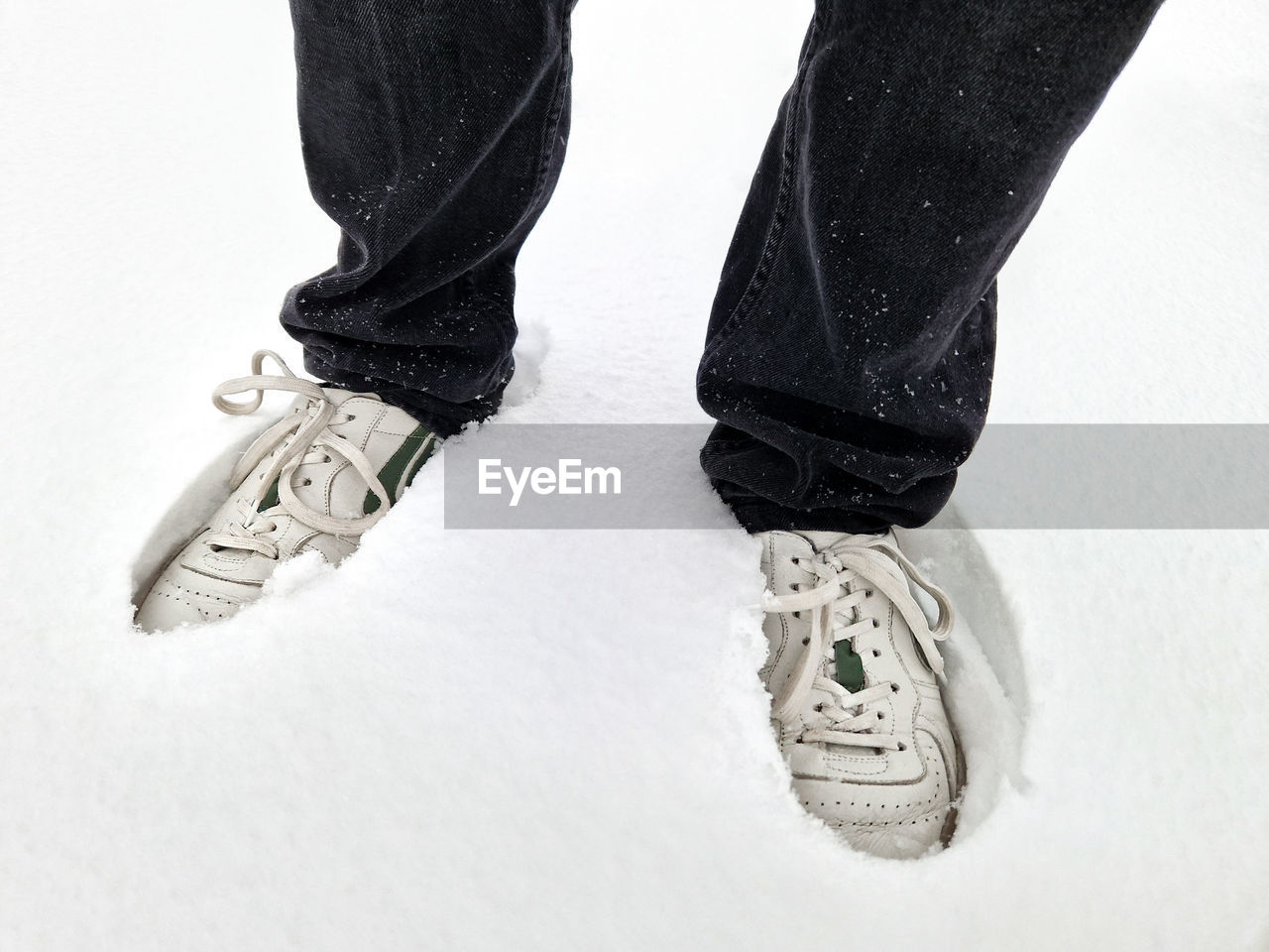 human leg, low section, shoe, footwear, limb, human limb, white, one person, black, human foot, sneakers, lifestyles, standing, adult, indoors, men, winter, sports, snow, walking shoe