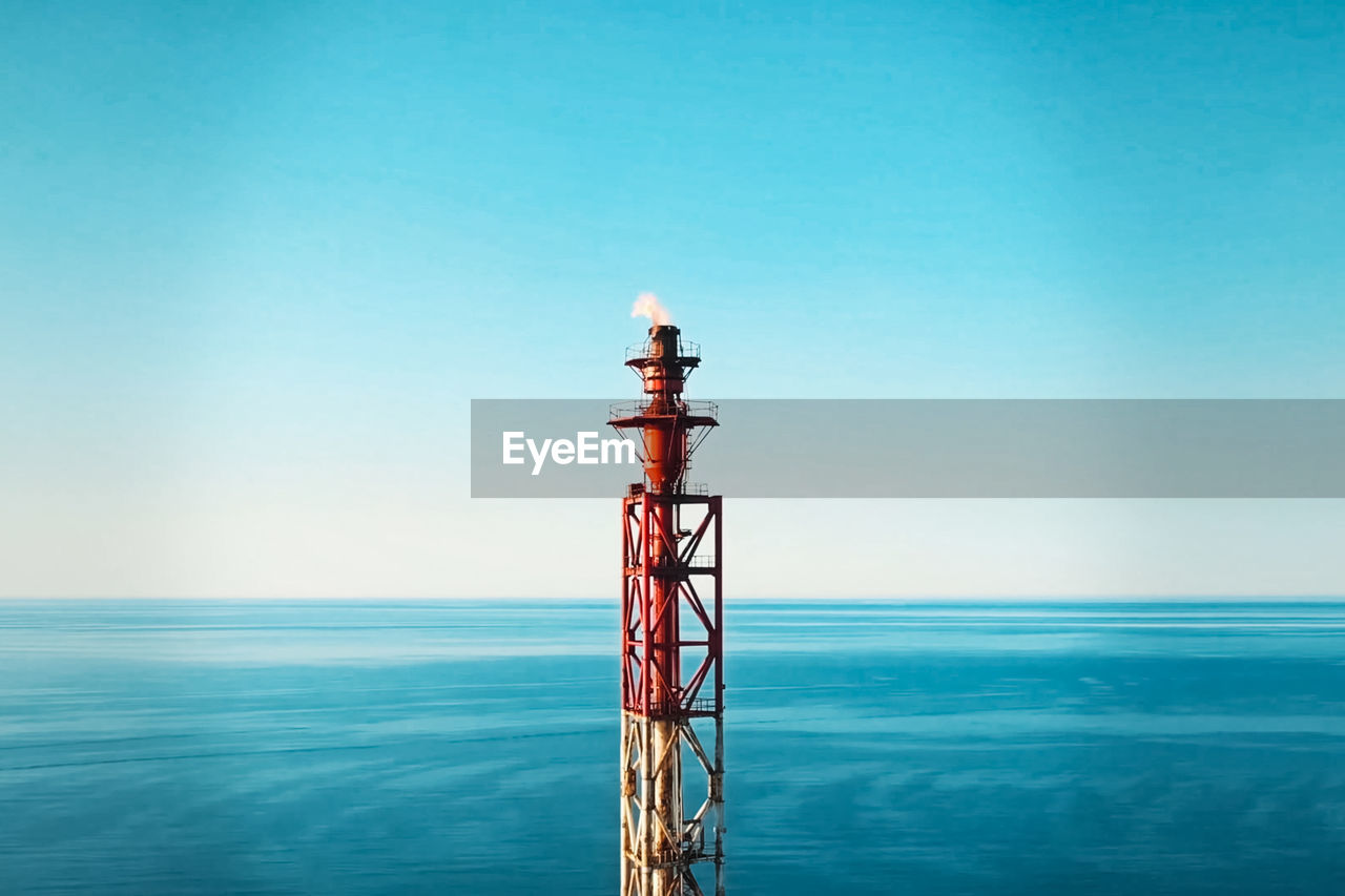 TOWER AGAINST CLEAR BLUE SKY