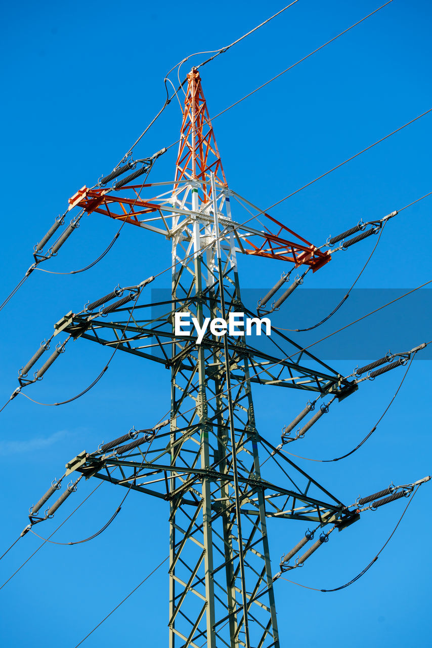 low angle view of electricity pylon against clear sky