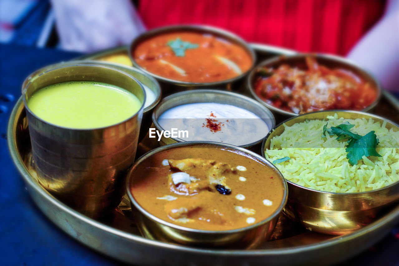 HIGH ANGLE VIEW OF VARIOUS FOOD ON TABLE