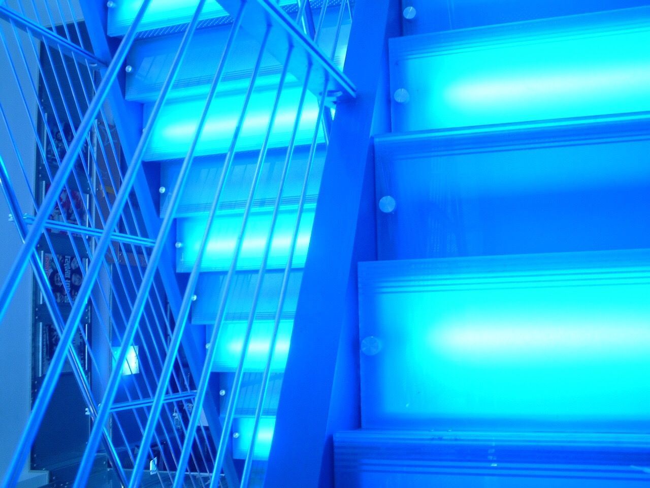 ABSTRACT IMAGE OF ILLUMINATED OFFICE BUILDING
