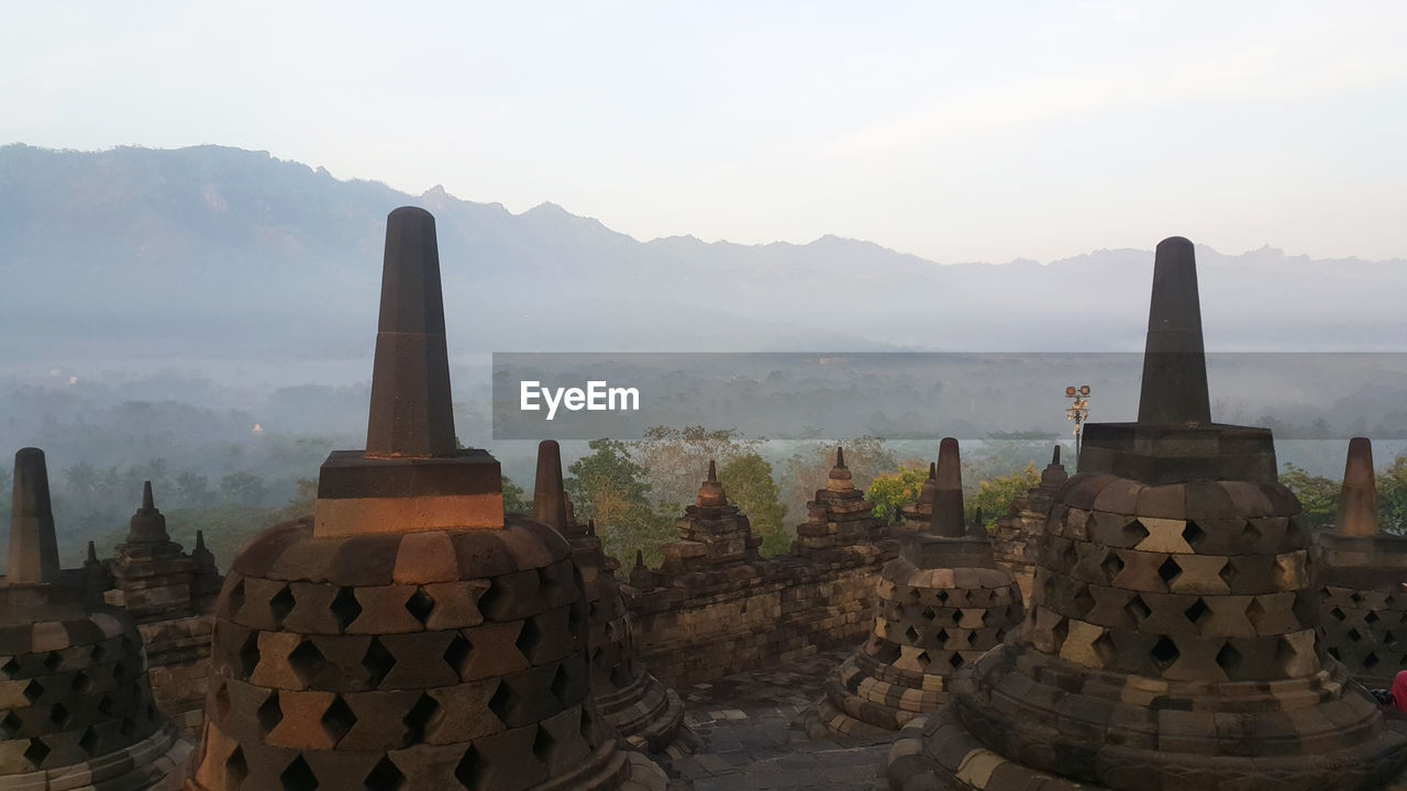 TEMPLE AGAINST SKY DURING SUNSET