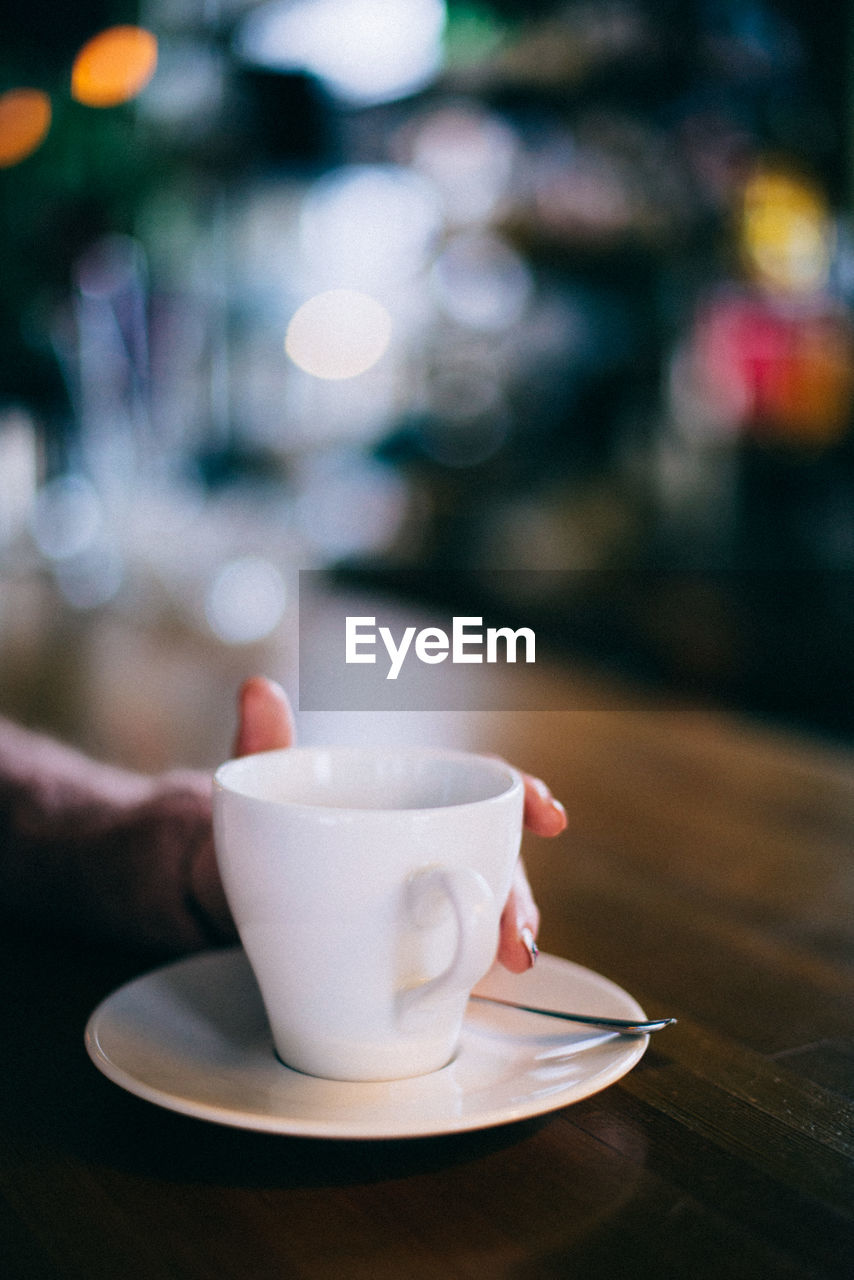 Close-up of coffee cup on table