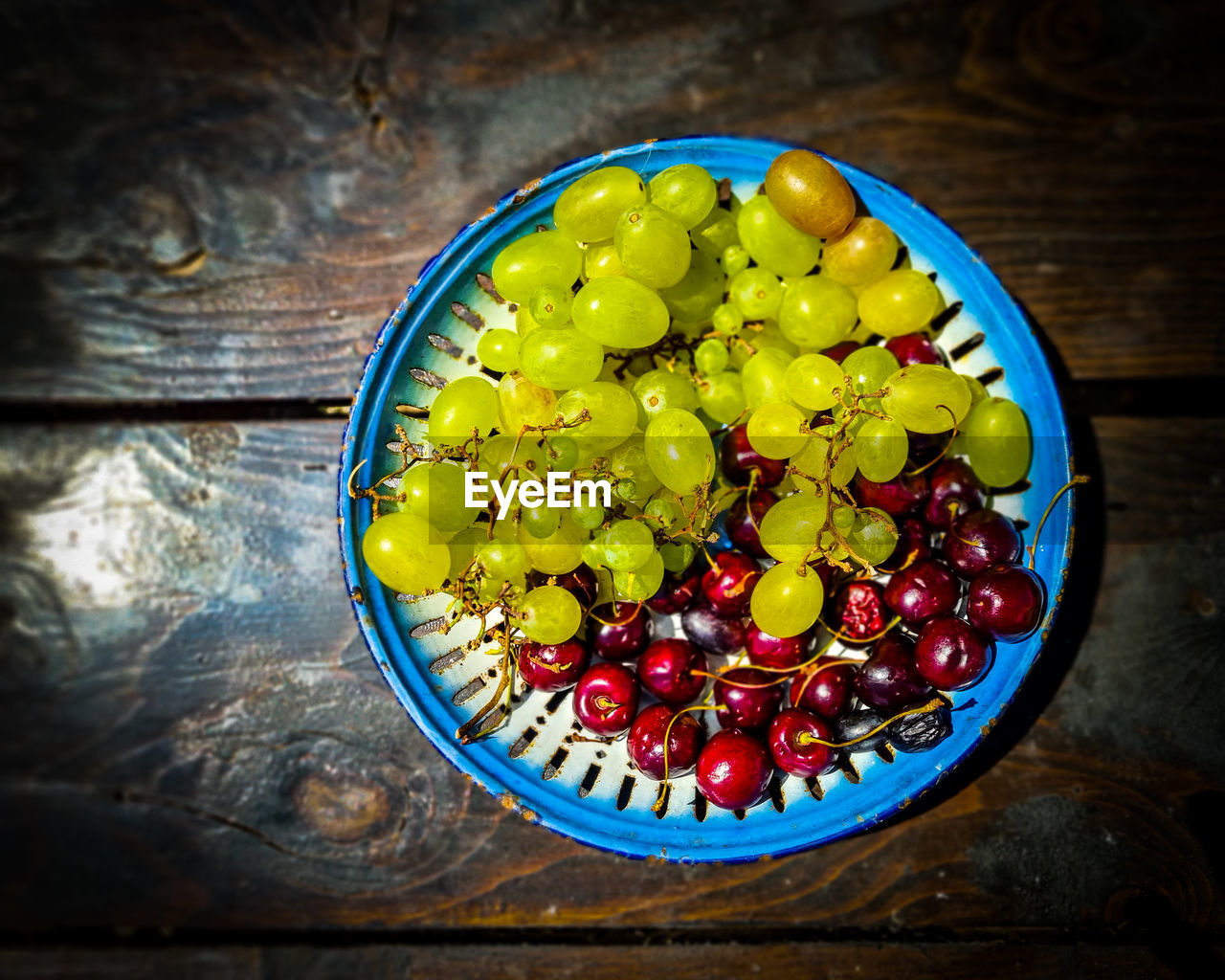 High angle view of fruits in bowl on table