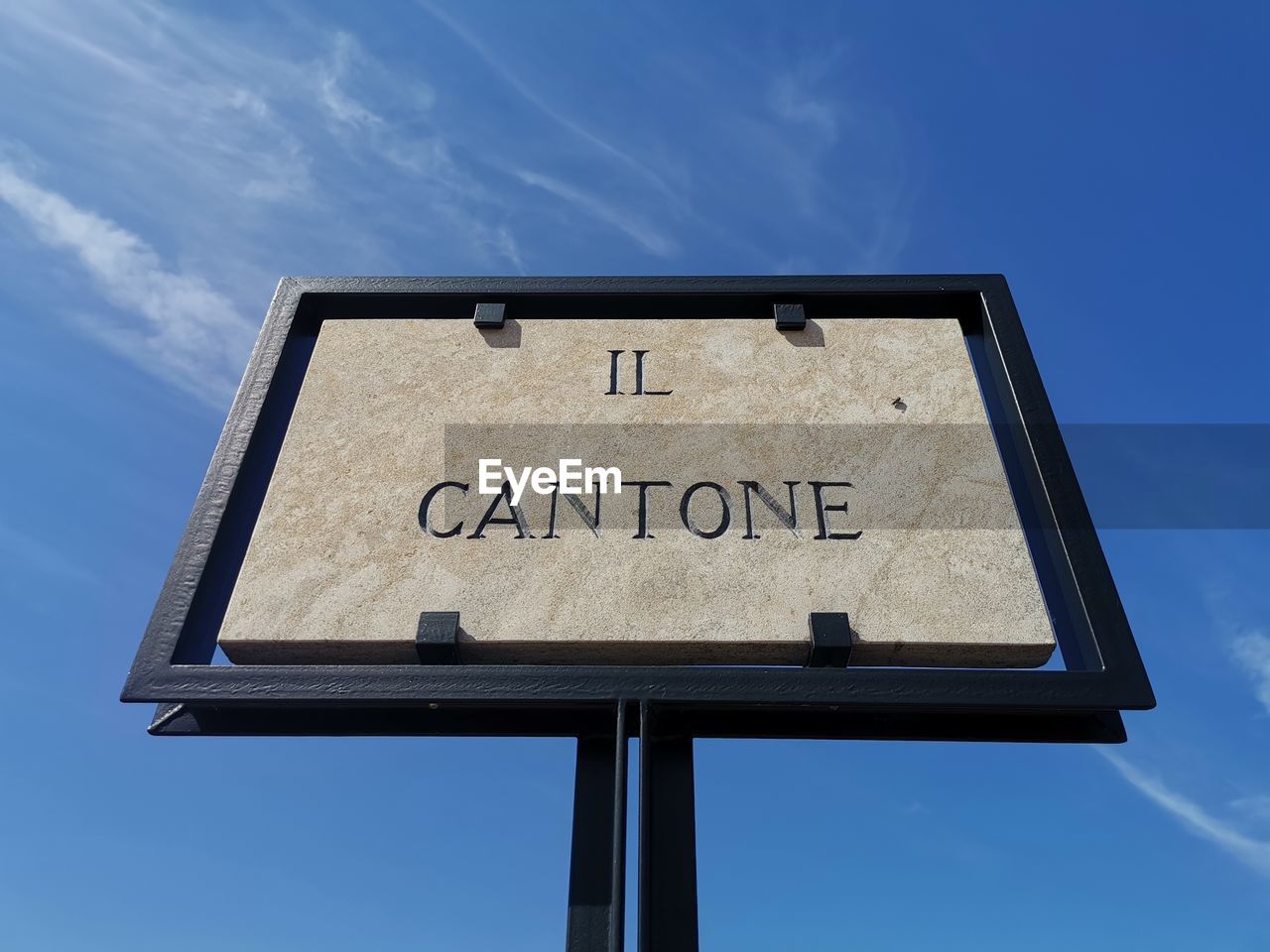 LOW ANGLE VIEW OF INFORMATION SIGN AGAINST SKY