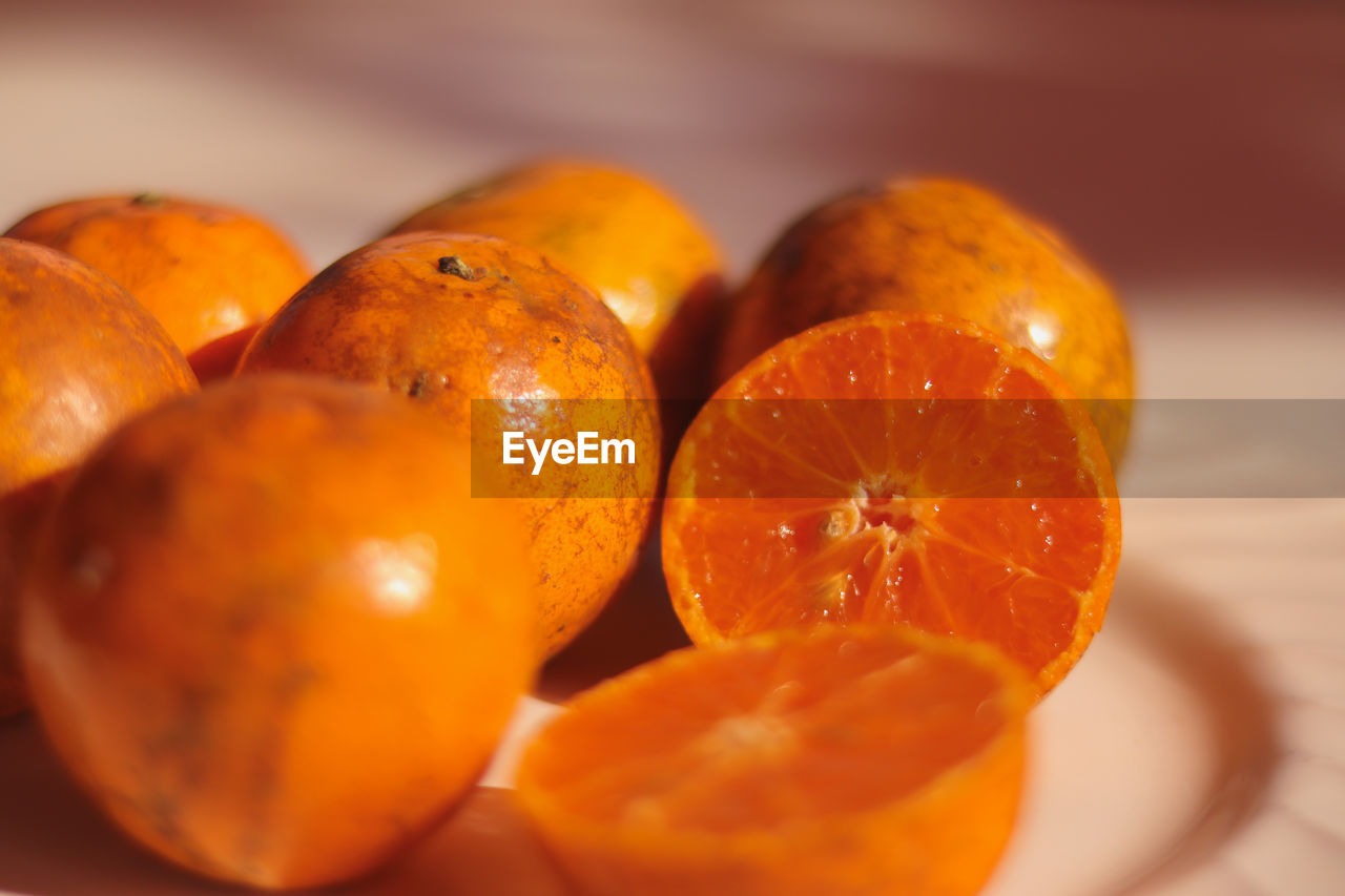 Close-up of orange fruits on table