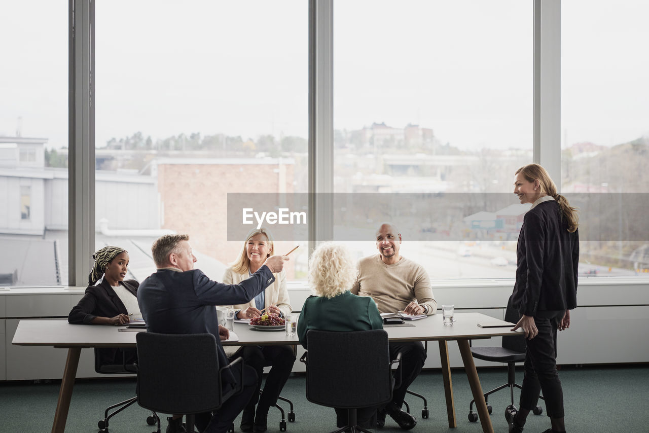 Business people having meeting in boardroom