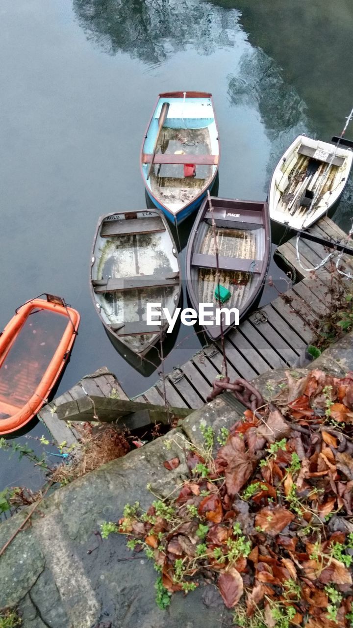 High angle view of boats moored in lake