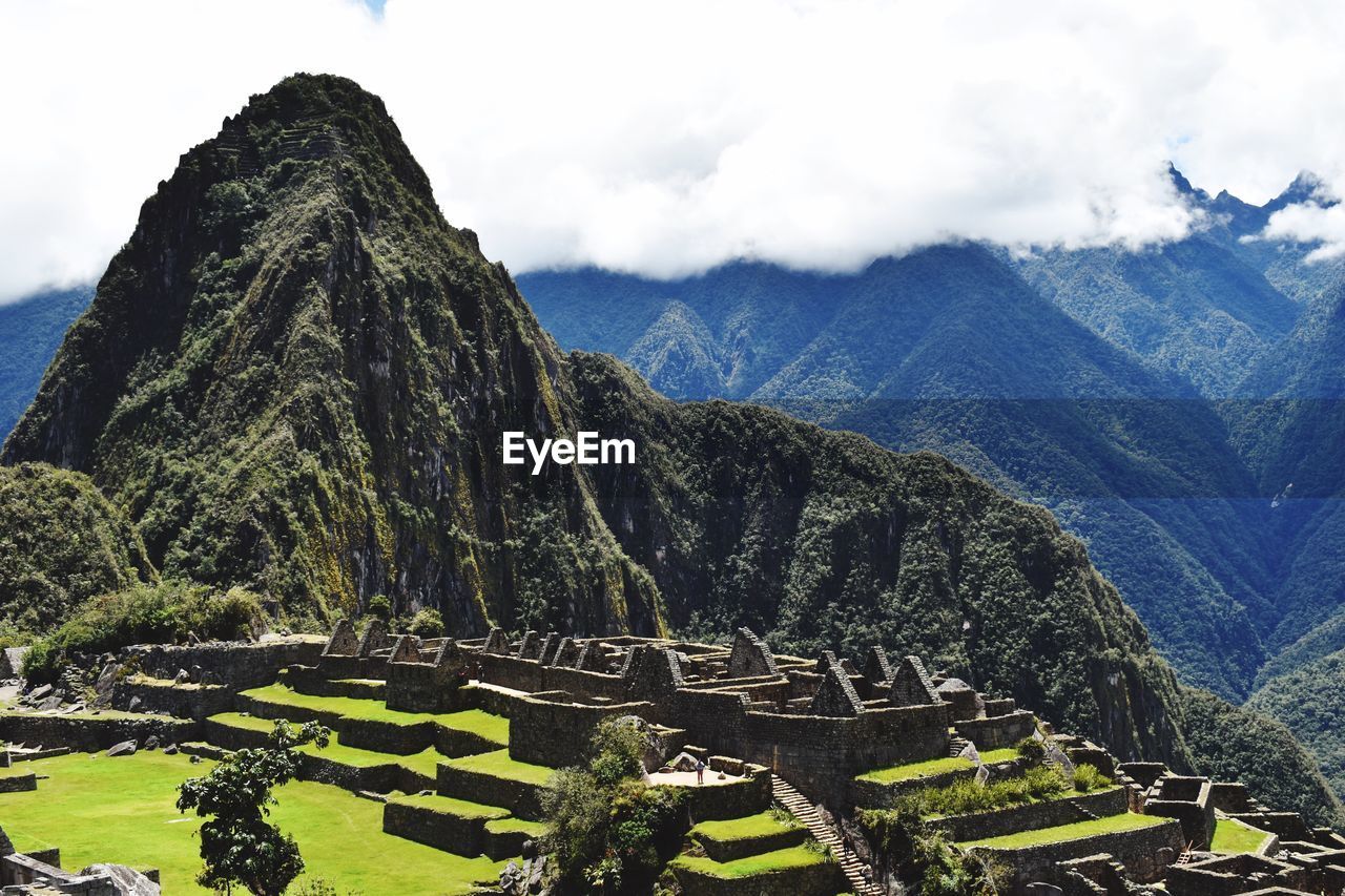 Panoramic view of mountain range against cloudy sky at machu picchu
