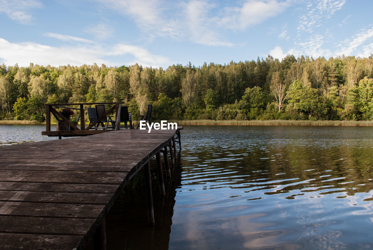 water, lake, sky, tree, nature, tranquility, pier, beauty in nature, cloud - sky, tranquil scene, scenics, day, outdoors, no people