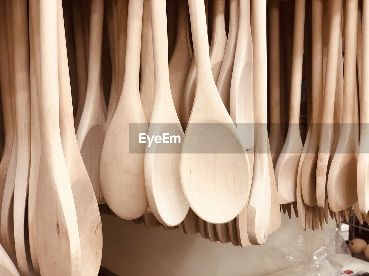 Cooking spoon made of wood used in kitchen for cooking kitchen household items