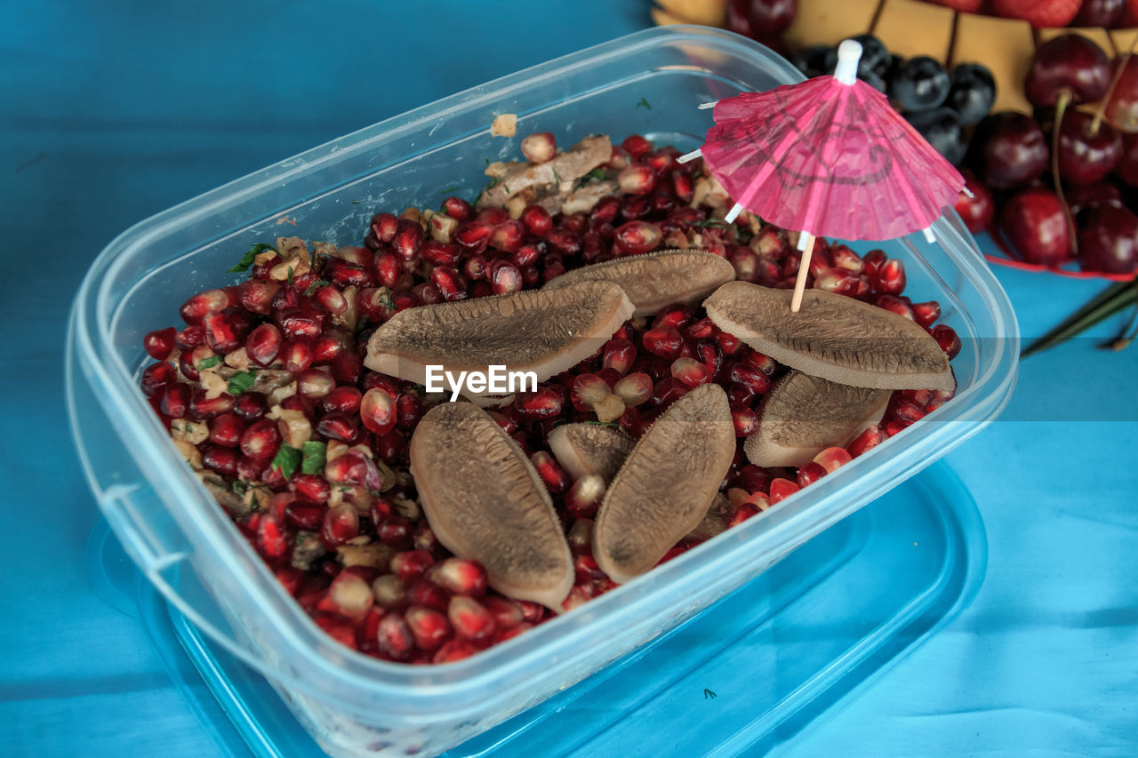 High angle view of fruits in container on table