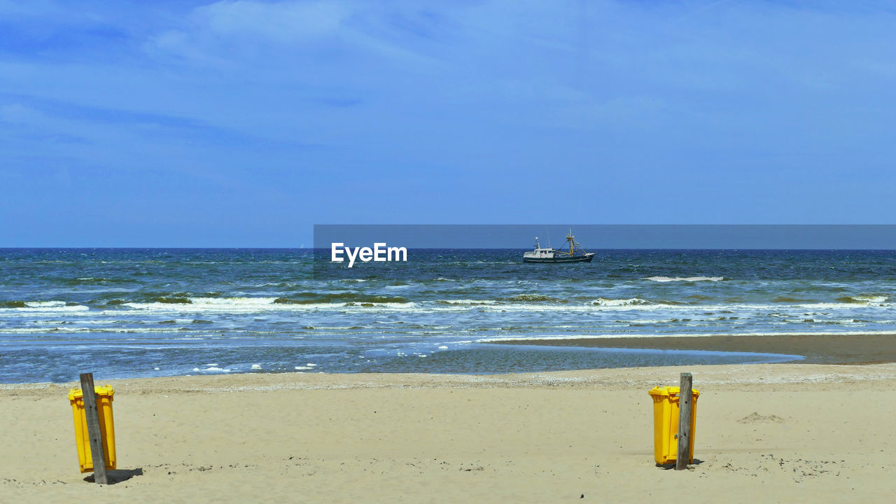 SCENIC VIEW OF SEA AGAINST BLUE SKY