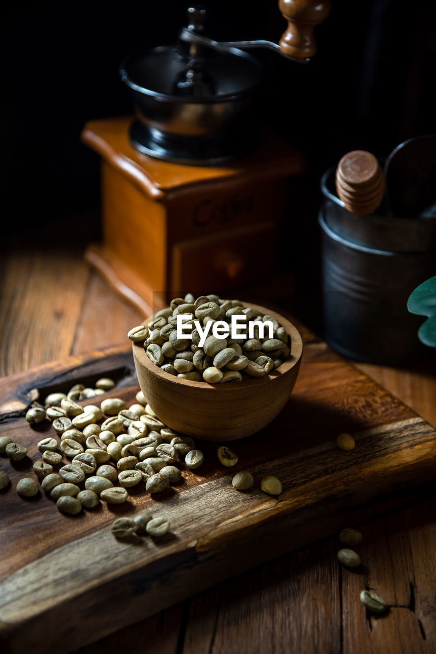 High angle view of a green coffee beans on table