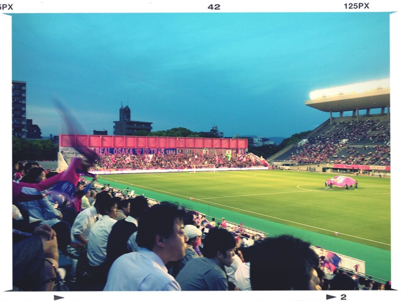 PEOPLE WATCHING STADIUM