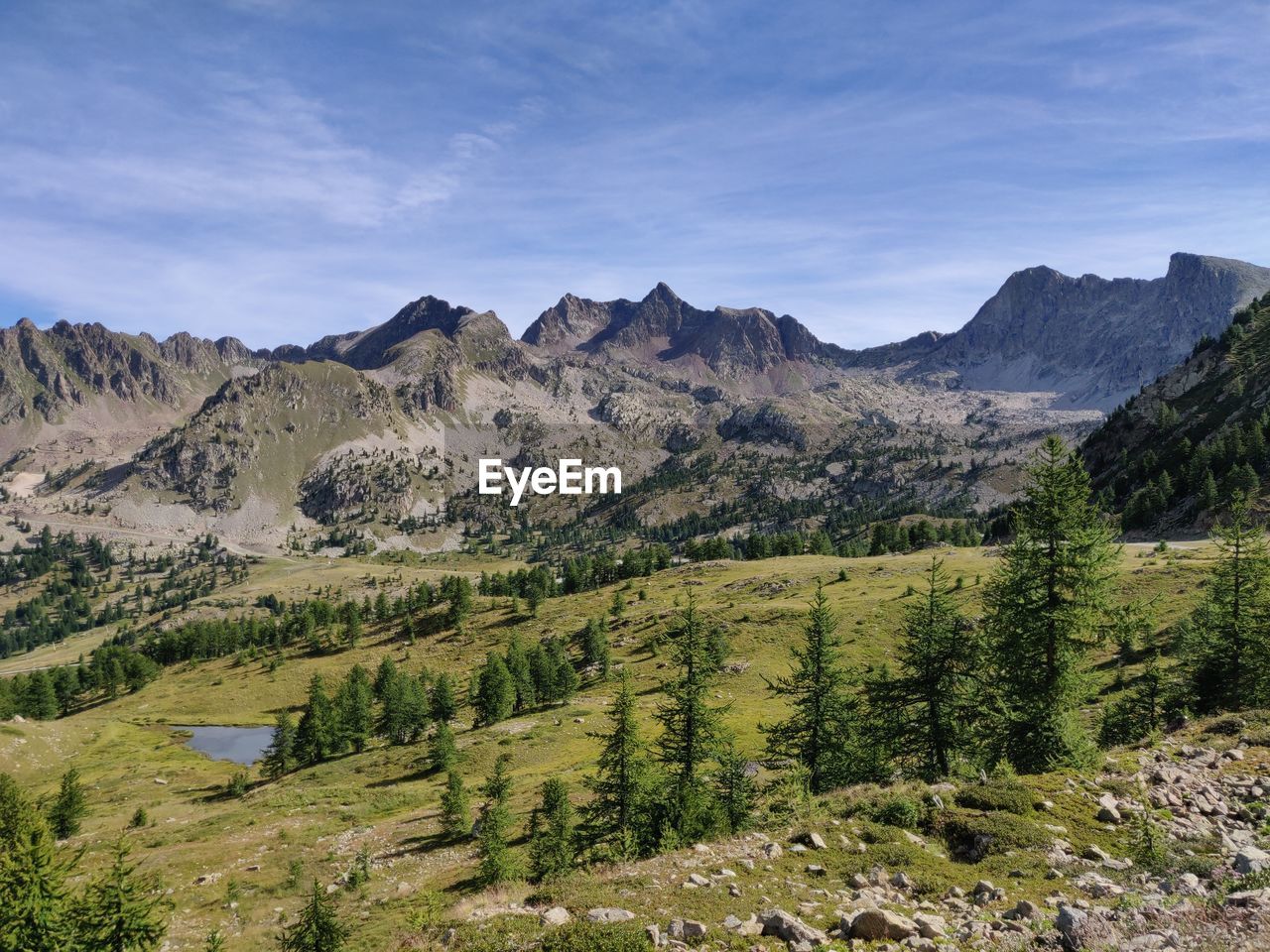 Scenic view of landscape and mountains against sky