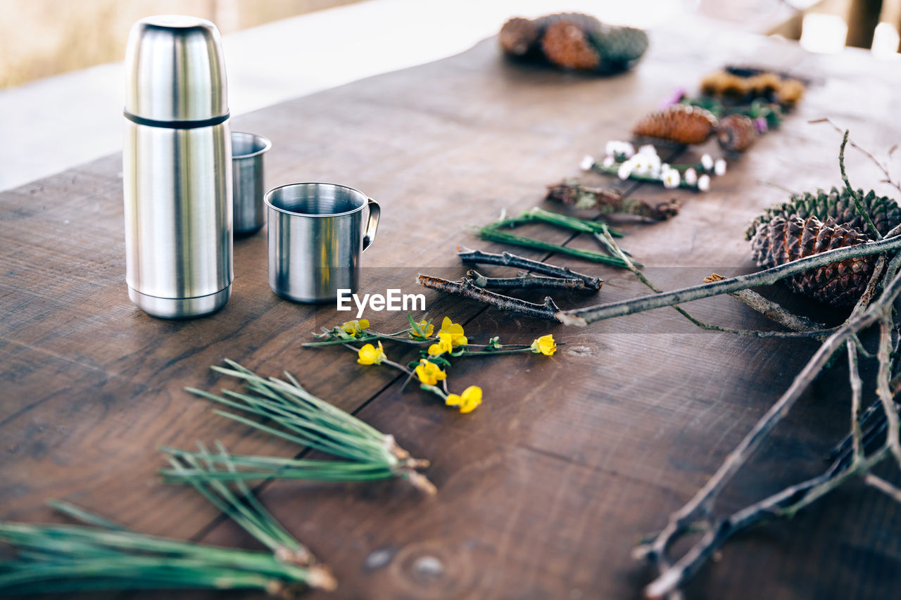 Text made of flowers on wooden table