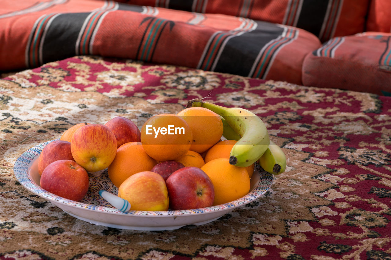 food and drink, food, healthy eating, fruit, wellbeing, freshness, produce, plant, peach, no people, container, orange color, abundance, citrus fruit, furniture, indoors, large group of objects, basket