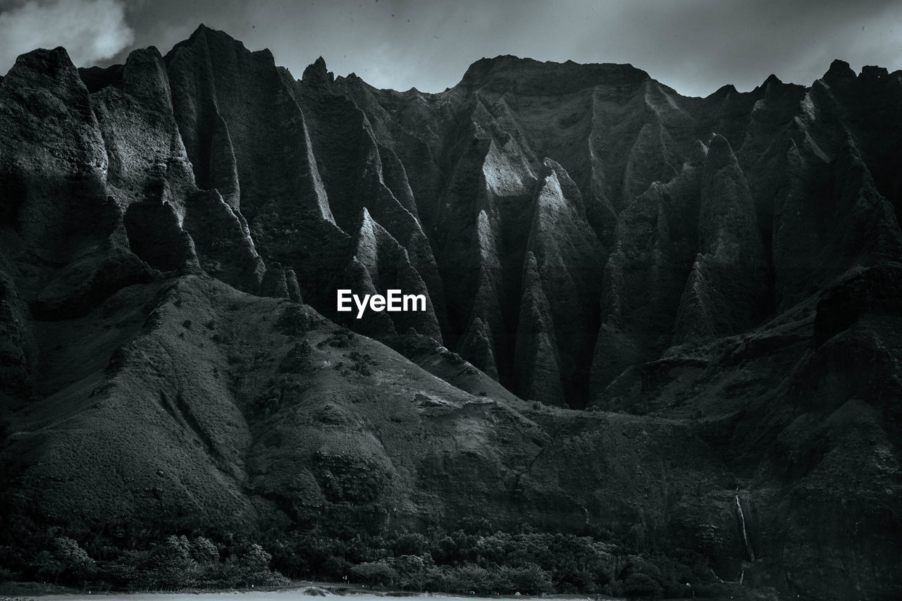 Panoramic view of rock formations on coastline. na pali coast, kauai island hawaii