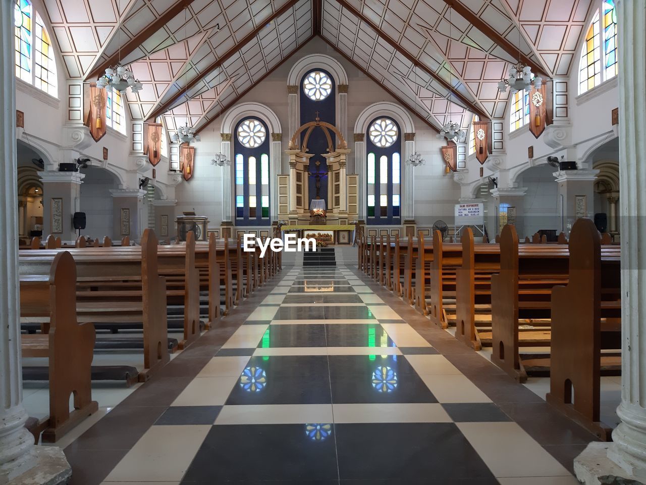 LOW ANGLE VIEW OF CEILING AND BUILDING