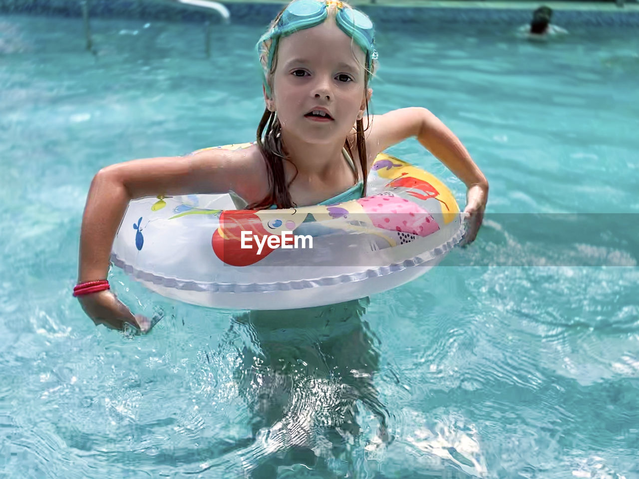 Portrait of girl in swimming pool